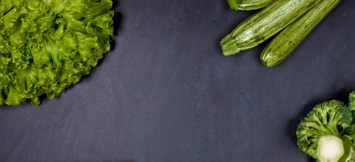 A bunch of broccoli sitting on top of a table